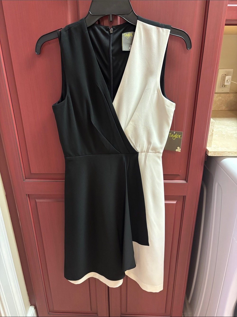 Taylor Black and White Sleeveless Wrap-Front Mini Dress